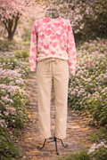 Pullover mit Herzmuster in Creme-Rosa